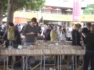 Buying books with the National Theatre in the Background